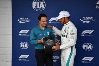 Lewis Hamilton, Mercedes AMG F1 receives the Pirelli Pole Position Award from Felipe Massa in Parc Ferme