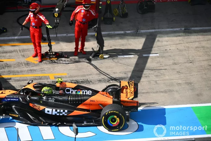 Lando Norris, McLaren MCL38, retires from the race with a rear puncture and damage after contact with Max Verstappen, Red Bull Racing RB20, whilst battling for the lead