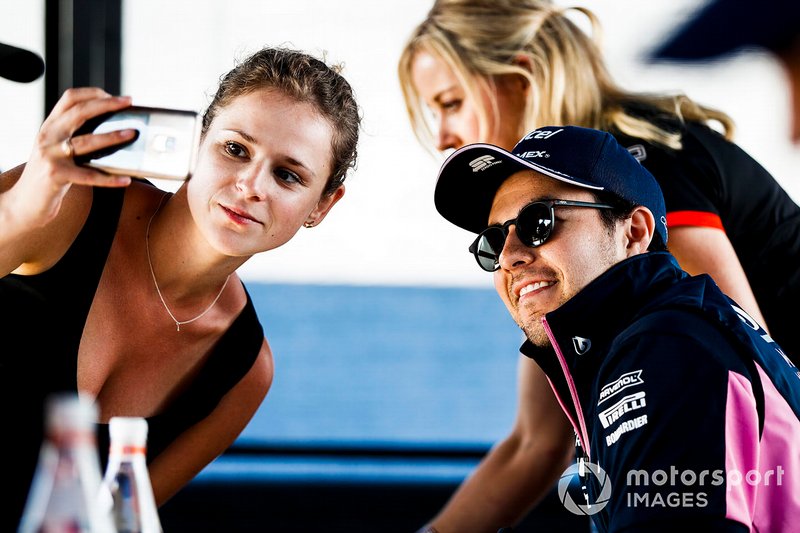 Sergio Perez, Racing Point poses for a seflie with a fan