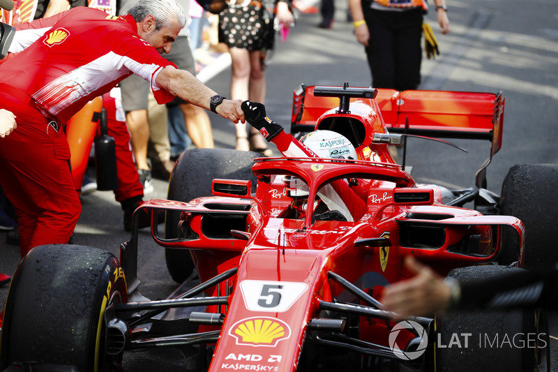 Sebastian Vettel, Ferrari SF71H, is greeted by Maurizio Arrivabene, Team Principal, Ferrari, after t