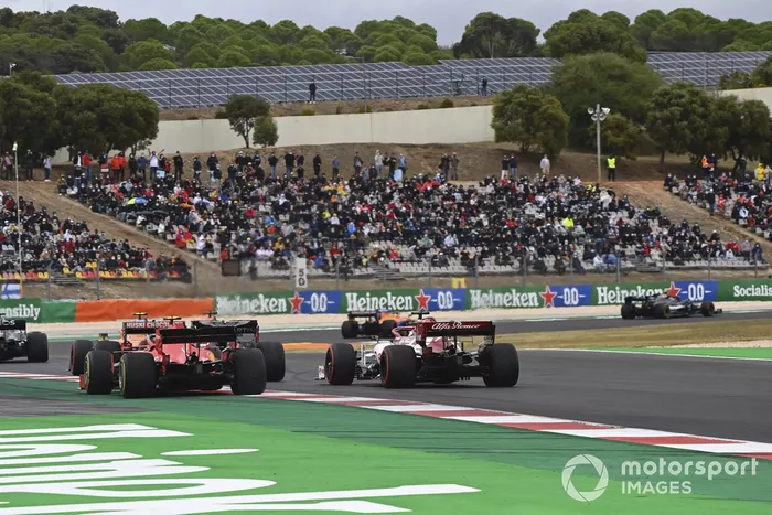 Charles Leclerc, Ferrari SF1000, Kimi Raikkonen, Alfa Romeo Racing C39, at the start