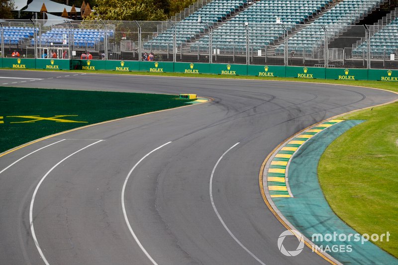 Empty track and grandstands at turn 1