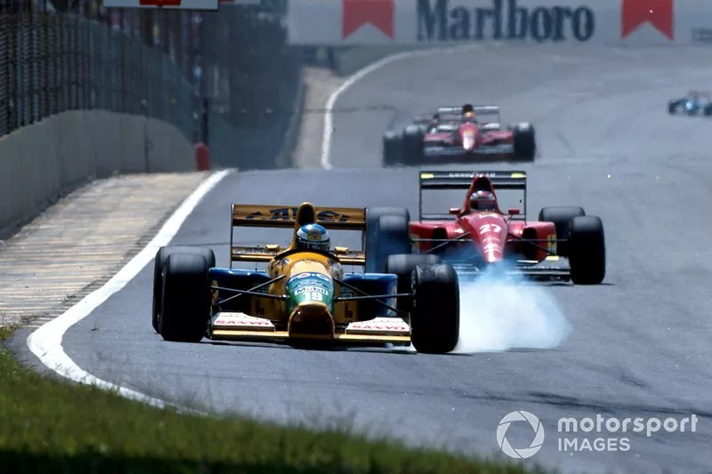 Michael Schumacher, Benetton B191B Ford leads Jean Alesi, Ferrari F92A