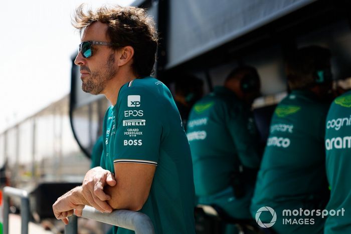 Fernando Alonso, Aston Martin F1 Team, on the pit wall