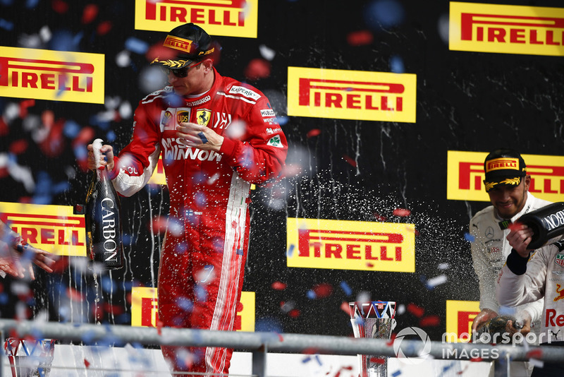 Podio: ganador de la carrera Kimi Raikkonen, Ferrari