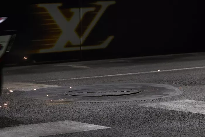 A manhole cover comes loose after 