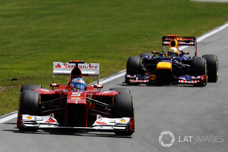 Fernando Alonso, Ferrari F2012 ahead of Sebastian Vettel, Red Bull Racing RB8