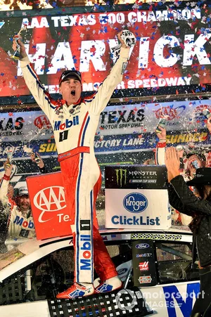 Kevin Harvick, Stewart-Haas Racing, Ford Fusion Mobil 1 celebrates his win in Victory Lane