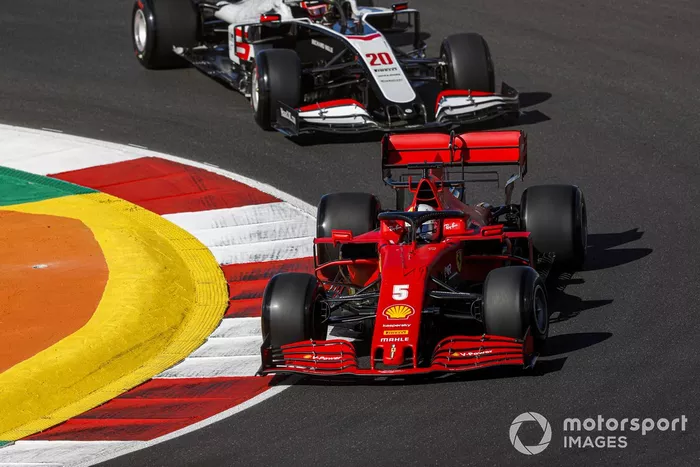 Sebastian Vettel, Ferrari SF1000, Kevin Magnussen, Haas VF-20