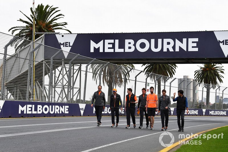Charles Leclerc, Ferrari, walks the track with his team
