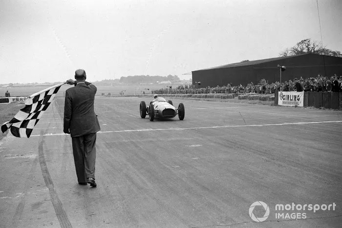 Reg Parnell, BRM P15 takes the chequered flag