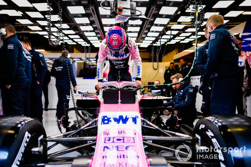 Lance Stroll, Racing Point RP19, getting into the car in the garage