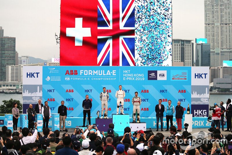 The national flags show above the top three on the podium