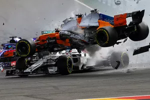 Charles Leclerc, Sauber C37, Fernando Alonso, McLaren MCL33 collide at the start of the race