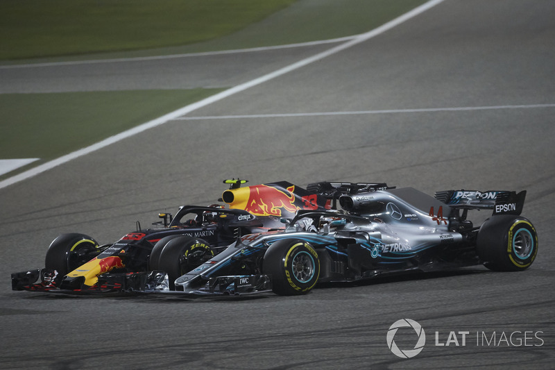 Lewis Hamilton, Mercedes AMG F1 W09, and Max Verstappen, Red Bull Racing RB14 Tag Heuer, make contact resulting in a puncture for the latter