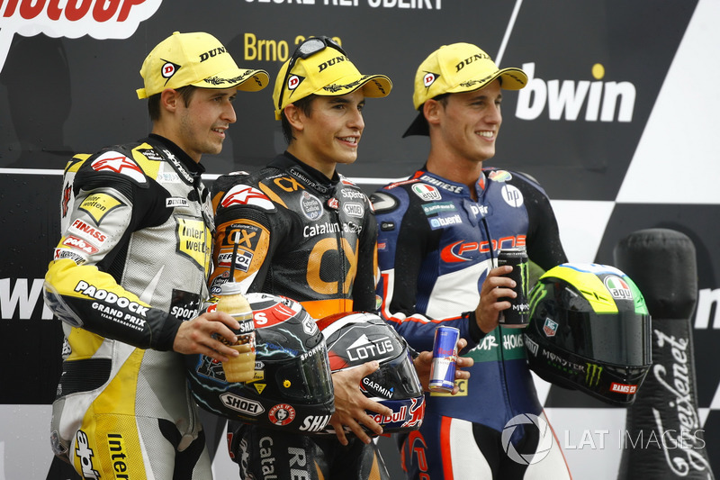 Podium: second place Thomas Luthi, Race winner Marc Marquez, third place Pol Espargaro