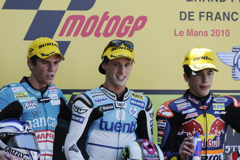 Podium: second place Nicolás Terol, Race winner Pol Espargaro, third place Marc Marquez