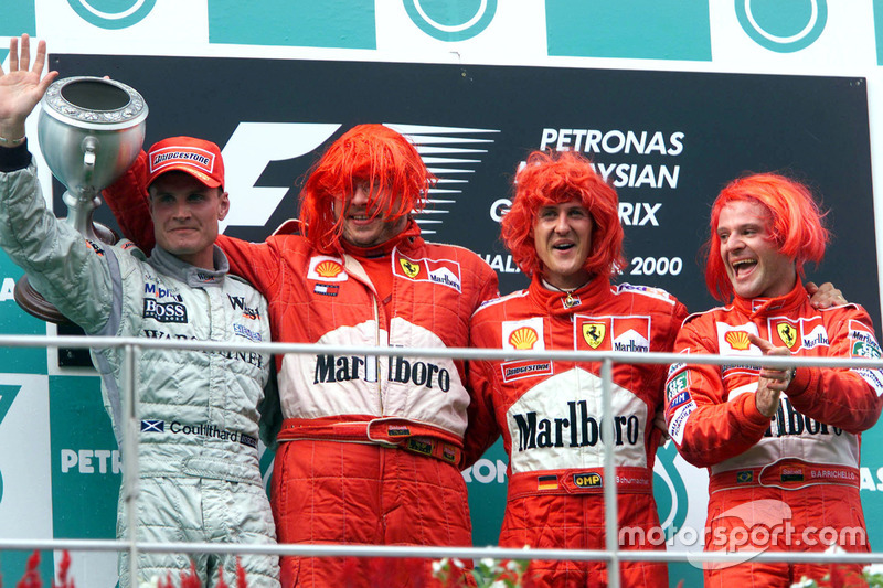 Podium: second place David Coutlhard, McLaren; Ross Brawn, Ferrari; Race winner Michael Schumacher, Ferrari; third place Rubens Barrichello, Ferrari