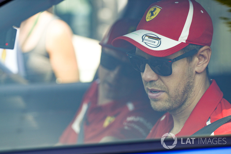 Kimi Raikkonen, Ferrari, and Sebastian Vettel, Ferrari, at the track