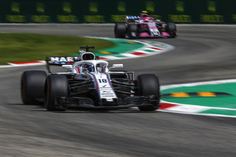 Lance Stroll, Williams FW41 and Esteban Ocon, Racing Point Force India VJM11
