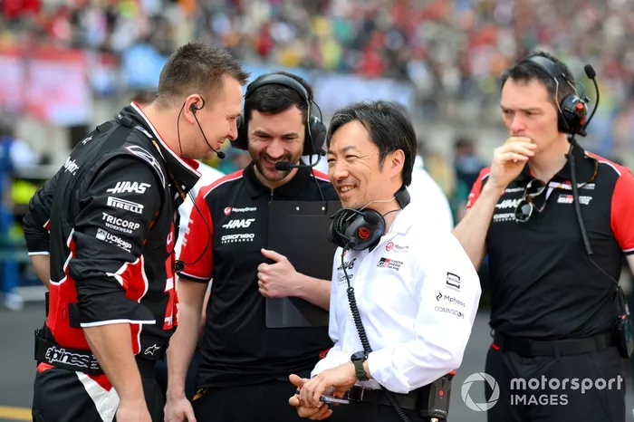 SHANGHAI, CHINA - MARCH 22: Ayao Komatsu, Team Principal of Haas F1 on the grid with Haas F1 team members prior to the Sprint ahead of the F1 Grand Prix of China at Shanghai International Circuit on March 22, 2025 in Shanghai, China. (Photo by Simon Gallo