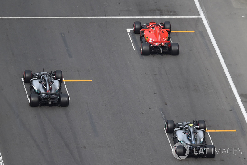 Sebastian Vettel, Ferrari SF71H, Lewis Hamilton, Mercedes-AMG F1 W09 EQ Power+ and Valtteri Bottas, Mercedes-AMG F1 W09 EQ Power+ on the grid