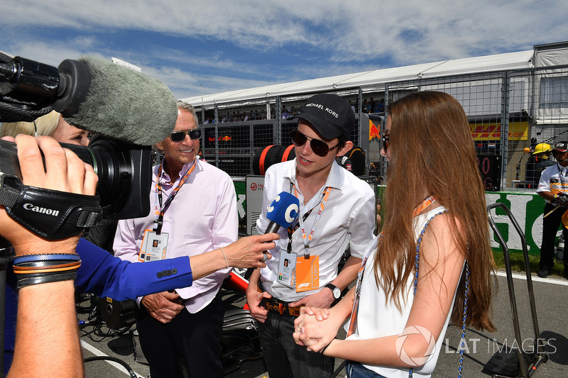 Michael Douglas, with his son Dylan Douglas, and daughter Carys Zeta-Douglas, on the grid