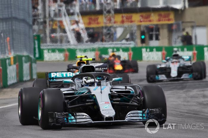 Valtteri Bottas, Mercedes AMG F1 W09, leads Max Verstappen, Red Bull Racing RB14