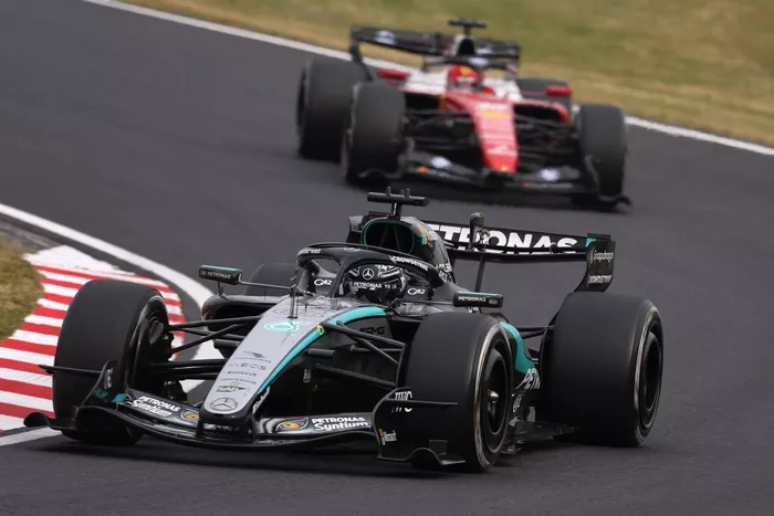 Charles Leclerc, Ferrari; George Russell, Mercedes