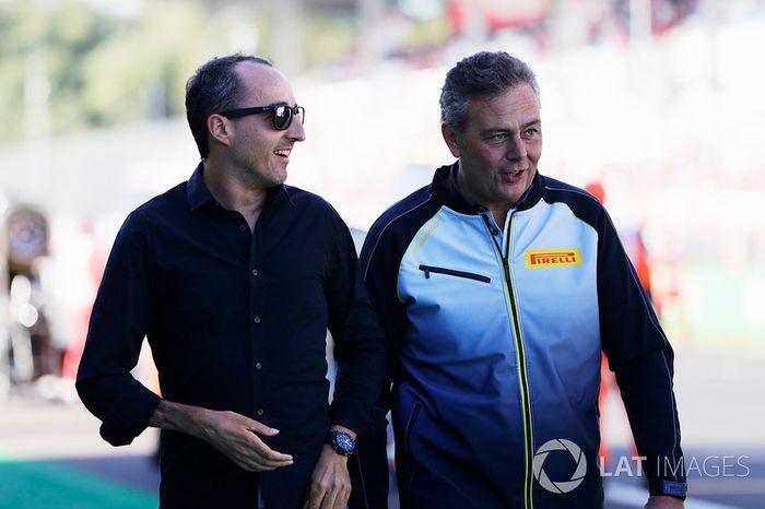  Robert Kubica, Mario Isola, Pirelli Racing Manager