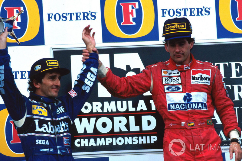 Podium: Race winner Ayrton Senna, McLaren, second place and World Champion Alain Prost, Williams