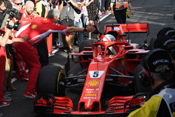 Race winner Sebastian Vettel, Ferrari SF71H arrives in parc ferme and celebrates with Maurizio Arriv