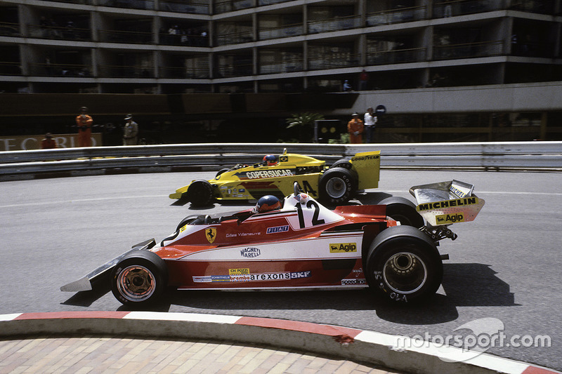 Gilles Villeneuve, Ferrari 312T3 passes Emerson Fittipaldi, Copersucar F5A-Ford