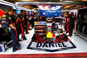 The Red Bull team with a message of support for Daniel Ricciardo, Red Bull Racing RB14, in the garage