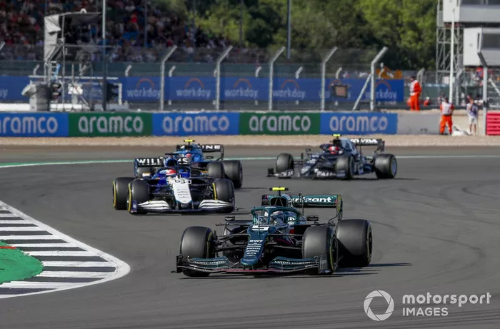 Sebastian Vettel, Aston Martin AMR21, George Russell, Williams FW43B, and Esteban Ocon, Alpine A521