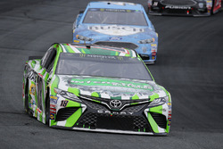 Kyle Busch, Joe Gibbs Racing Toyota, leads Kevin Harvick, Stewart-Haas Racing Ford