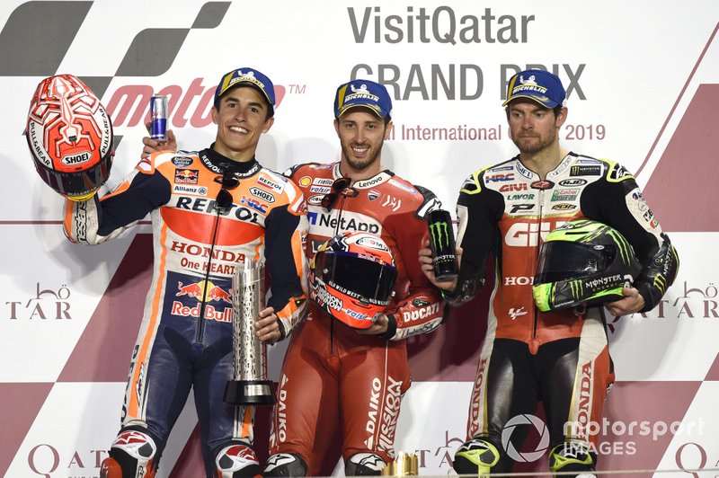 Подіум: друге місце Марк Маркес, Repsol Honda Team, переможець гонки Андреа Довіціозо, Ducati Team, третє місце Кел Кратчлоу, Team LCR Honda