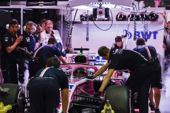 Sergio Perez, Racing Point Force India VJM11, is returned to the garage
