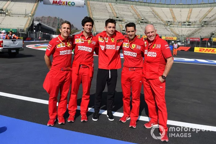 Charles Leclerc, Ferrari poses for a photograph with his team