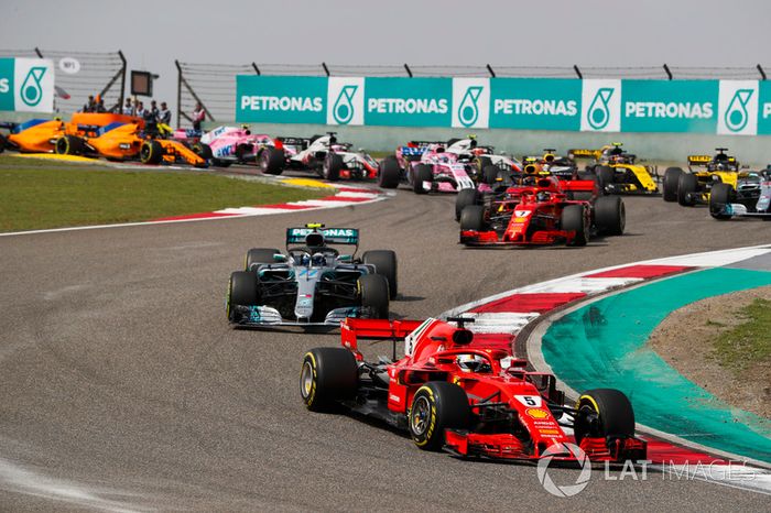 Sebastian Vettel, Ferrari SF71H, Valtteri Bottas, Mercedes AMG F1 W09, Kimi Raikkonen, Ferrari SF71H, Max Verstappen, Red Bull Racing RB14 Tag Heuer