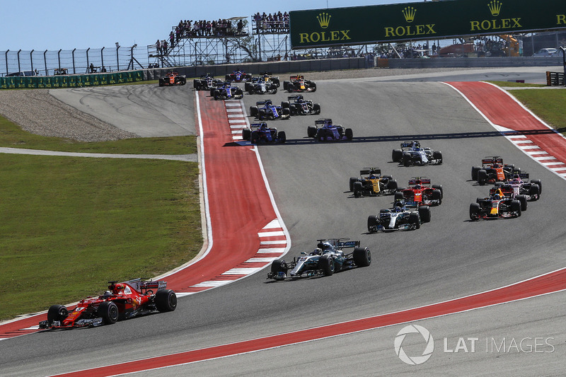 Sebastian Vettel, Ferrari SF70H leads Lewis Hamilton, Mercedes-Benz F1 W08  at the start of the race