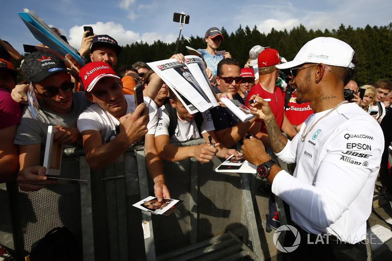 Lewis Hamilton, Mercedes AMG F1, signs autographs for fans