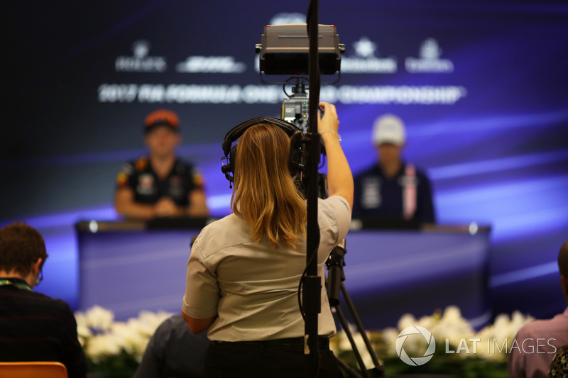 Cameraman in the Press Conference