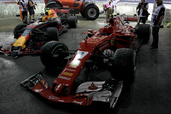 The damaged cars of Max Verstappen, Red Bull Racing RB13 and Kimi Raikkonen, Ferrari SF70H after crashing out at the start of the race