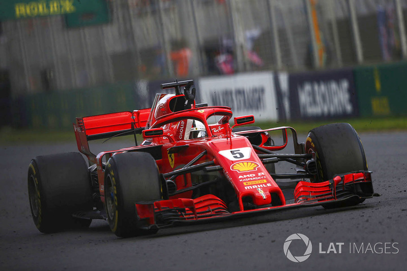 Sebastian Vettel, Ferrari SF71H, celebrates in his cockpit after winning the race