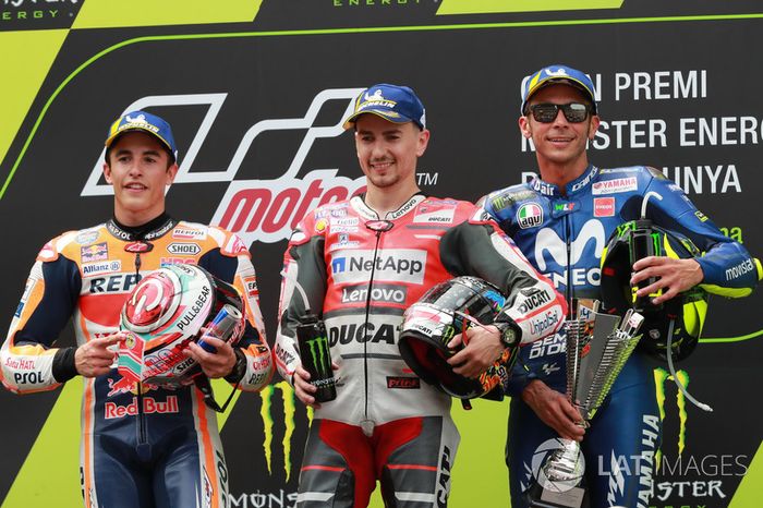 Podio: 1º Lorenzo, 2º Márquez, 3º Rossi