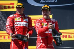Podium: race winner Sebastian Vettel, Ferrari, second place Kimi Raikkonen