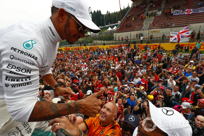 Race winner Lewis Hamilton, Mercedes AMG F1, celebrates with fans after the race