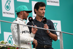Lewis Hamilton, Mercedes AMG F1 and Mark Webber, on the podium