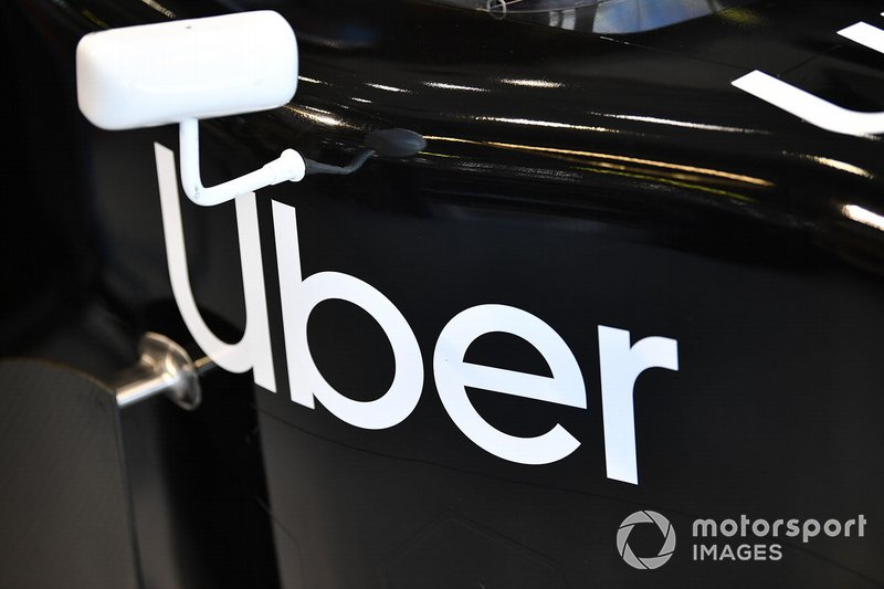 Two-seater side-pod and cockpit detail, including Uber branding